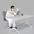 Man In White Lab Coat Using Microscope With Laboratory Equipment On Table