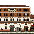 Traditional Red Brick Multi Story Building With Red Tile Roof Arched Windows And Wooden Accents