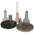 Wine Bottles And Glasses With Brown Liquid On Marble And Metal Trays