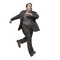 Full Length Man in Dark Formal Suit Running Dynamically Against Plain Light Background