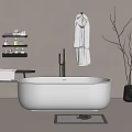 White Freestanding Bathtub In Modern Bathroom With Bathrobe Black Vase And Decorative Twigs