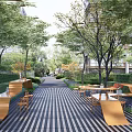Tranquil Residential Landscape Featuring Striped Flooring Wooden Seating Circular Fire Pit And Lush Greenery
