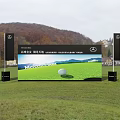 Mercedes Benz Car Display Event With Outdoor Stage And Indoor Venue Setup