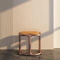 Modern Minimalist Stool With Copper Metal Frame And Leather Seat Against Wall