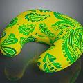 Yellow U Shaped Pillow With Green Leaf Patterns And Soft Surface
