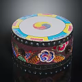 Traditional Musical Drum With Artistic Painted Patterns And Decorative Beaded Accents