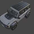 Rugged Off Road Vehicle with Black Roof Yellow Headlights Large Tires and UK License Plate