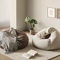 Brown And Beige Bean Bag Chairs With Pillows On Rug Near Potted Plant Wall Art