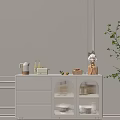 Stylish White Sideboard With Drawers Glass Doors And Decorative Fruits Kettle Green Plant