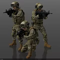 Three Soldiers in Military Camouflage Uniforms With Helmets and Rifles in Combat Stance