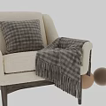 Beige Accent Chair with Plaid Pillow and Fringed Plaid Blanket on Dark Wooden Legs
