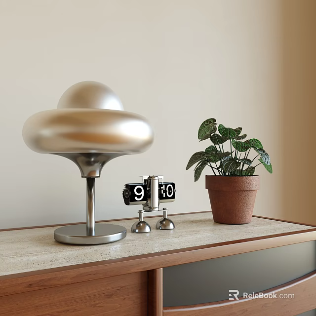 Modern Metallic Silver Table Lamp With Green Plant Small Clock And Wooden Table 3d model 