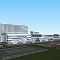 Spacious Large Building Complex With Green Roof And Parking Area Surrounded By Trees