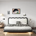 Double Bed With Zebra Print Quilt Black And White Headboard Nightstand And Table Lamp