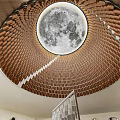 Unique Spiral Leisure Area With Brown Brick Walls And Circular Moon Ceiling