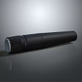 Professional Black Handheld Microphone Isolated On Gray Background With Metal Mesh Head And Reflection
