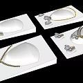 Elegant Pearl Jewelry Collection With Gold Necklaces Earrings On White Display Stands