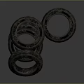 Rusty Old Car Tires Stacked Together With Worn Tread On Dark Background