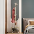 Stylish Golden Coat Rack In Bedroom Corner With Pink Coat Hat And Storage Basket