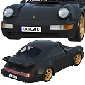 Black Two Door Sports Car With Gold Rims UK License Plate And Rear Spoiler