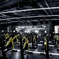 Modern Fitness Gym Interior With Bright Lighting And Yellow Black Spin Bikes