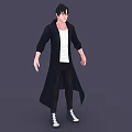 A Man Wearing Black Long Coat White T-shirt Dark Pants and Sneakers Against Gray Background
