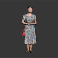 Casual Woman Standing In Floral Dress With Hat Red Bag And Sandals