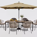Modern Outdoor Table with Chairs and Umbrella Featuring Vase and Fruits on Top
