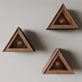 Three Triangular Wooden Wall Lamps with Decorative Design Mounted On Wall