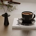 Stylish Tabletop with Black Vase Green Foliage Coffee Cup on Andrew Marr Book
