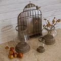 Vintage Decorative Ornament Combination With Metal Birdcage Glass Vases Berry Branches On Wooden Table