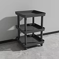Black Three Tier Modern Side Table with Wheels and Minimalist Design