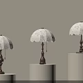 Elegant Table Lamps With White Lace Shades And Brown Bases On White Cylindrical Pedestals
