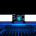 Contemporary Summit Hall With Multiple Screens And Blue Lit Seating Arrangement