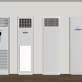 White Standing Air Conditioners Arranged Against Wall In Indoor Setting