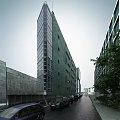 Modern High Rise Office Building With Glass Curtain Wall Street Cars And Pedestrians