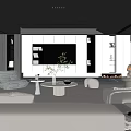 Modern Living Room Interior With Gray Sofa Round Coffee Table Green Plant And TV Wall
