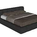 Black Leather Double Bed with Padded Headboard Light Colored Mattress and Side Table with Fruit