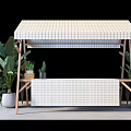 Modern Tea Break Area With White Grid Table Cabinet Wooden Frame And Green Plants