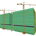 Modern Construction Site With High Rise Buildings Green Scaffolding And Tower Cranes