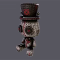 Stuffed Doll With Black Top Hat Red Accents Round Eyes And Black White Red Pattern