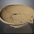 Ceramic Sculpted Bowl with Cracks Restoration Marks Decorative Rim Small Spout and Light Brown Color