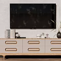 Modern TV Stand with Multiple Drawers in Light Wood Finish Featuring TV Books and Decor