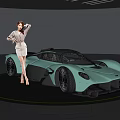 Green Sports Car Displayed on Circular Platform with Elegant Woman in Modern Exhibition Hall