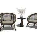 Brown Woven Rattan Outdoor Sofa Chairs With White Cushions And Decorative Side Table