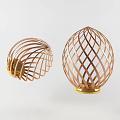 Tech Exhibition Hall Featuring Two Egg Shaped Lattice Exhibits Brown Woven Structure And Golden Base