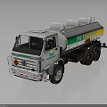 White Petroleum Tanker Truck With Green Yellow Stripes And Multiple Tanks