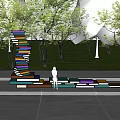 Campus Landscape Featuring Book Stacked Art Installation Lawn Trees And Colorful Seats With Students Reading