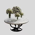 Round Marble Top Coffee Table With Black Base Glass Vases And White Roses