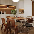 Cozy Modern Restaurant Dining Area With Wooden Table Chairs Green Plant Built-in Lighting And Shelves